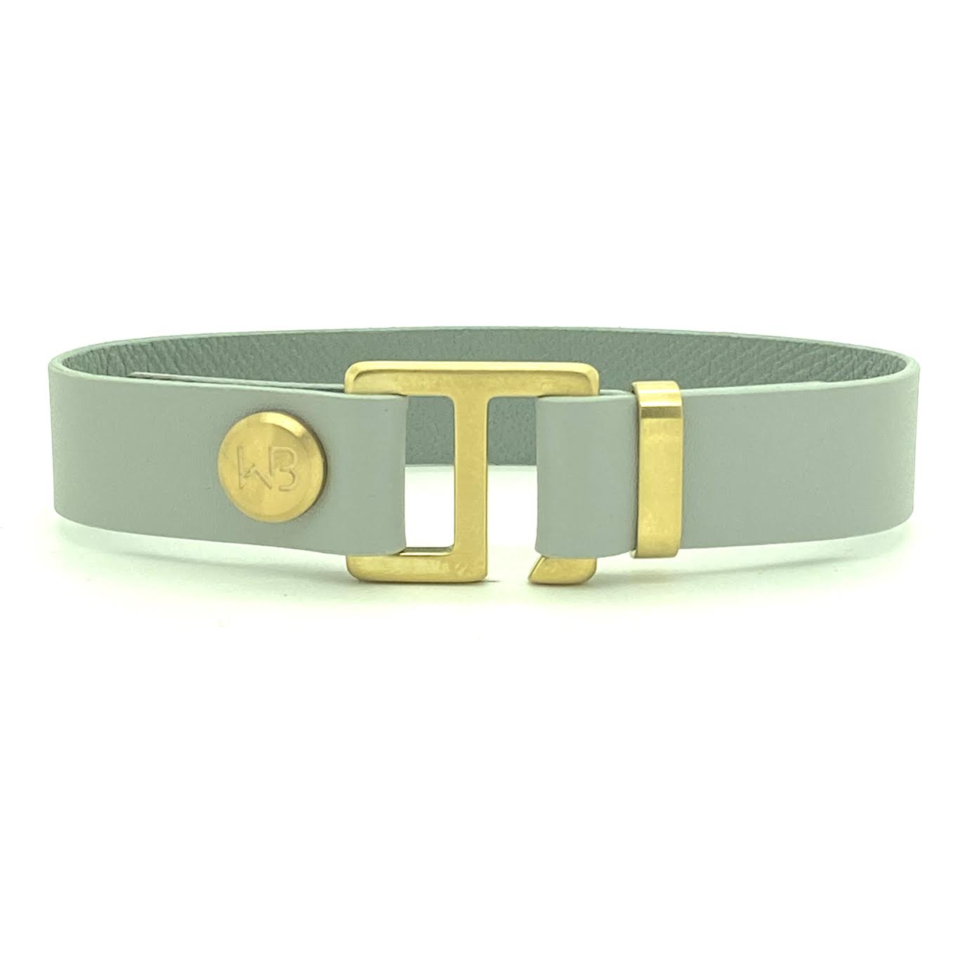 Our striking smoke grey leather cuff bracelet is paired perfectly with our artisan designed hardware. Choice includes rose gold, yellow gold, stainless steel or black ceramic. This adjustable size bracelet is a distinctive piece worn alone or with a WristBend stacking bracelet.  Made by WristBend