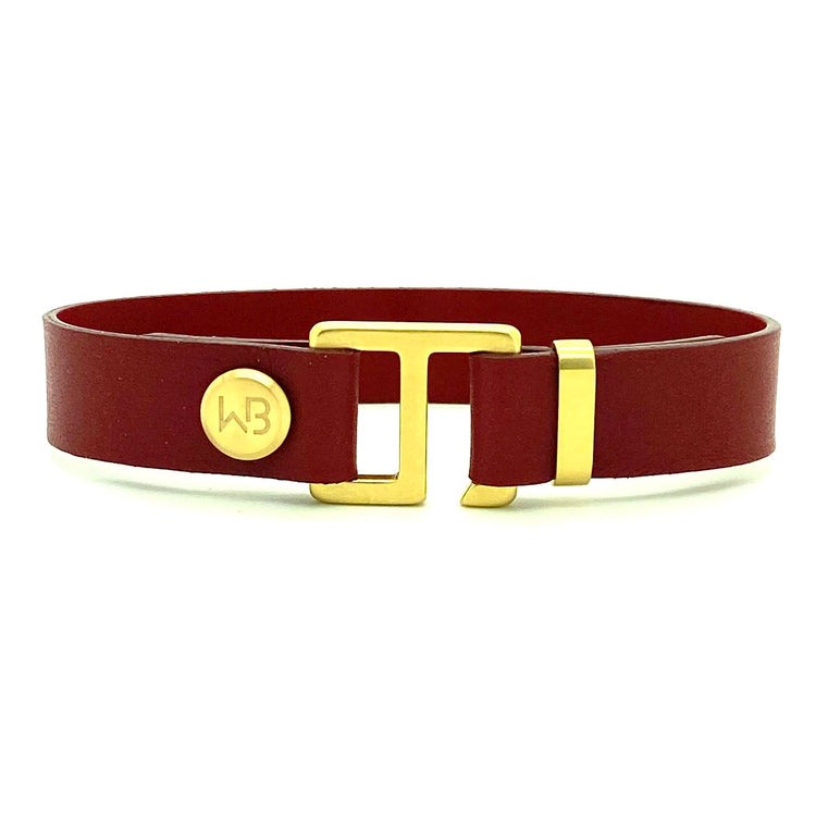 Our striking burgundy/black leather cuff bracelet is paired perfectly with our artisan designed hardware. Choices include rose gold, yellow gold, stainless steel or black ceramic. This adjustable size bracelet is a distinctive piece worn alone or with a WristBend stacking bracelet. Made by WristBend