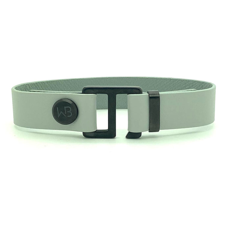 Our striking smoke grey leather cuff bracelet is paired perfectly with our artisan designed hardware. Choice includes rose gold, yellow gold, stainless steel or black ceramic. This adjustable size bracelet is a distinctive piece worn alone or with a WristBend stacking bracelet. Made by WristBend