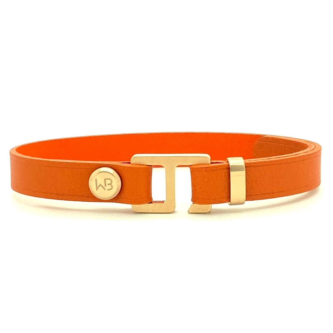 Trendy orange French and Italian leather cuff bracelet. Made by WristBend