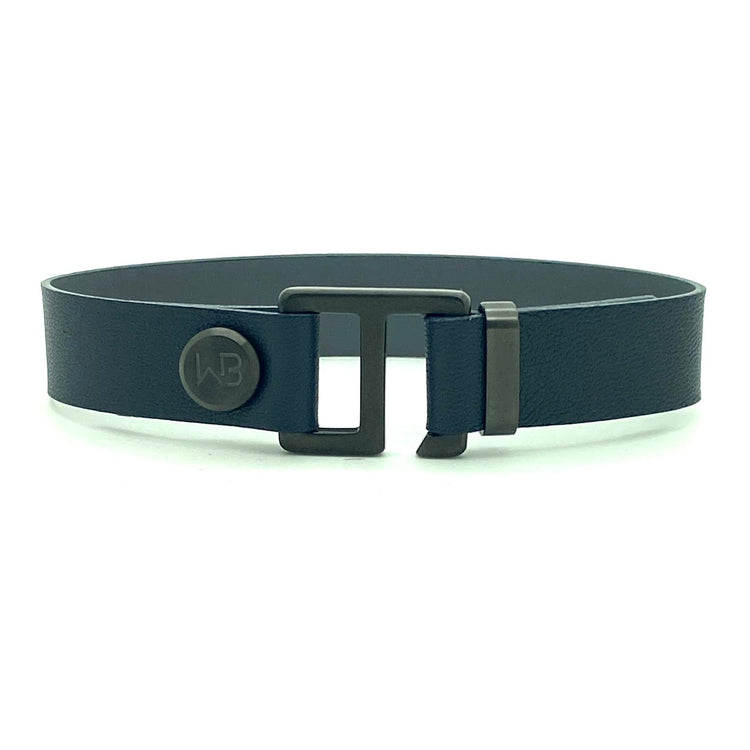 Our striking navy blue/charcoal grey leather cuff bracelet is paired perfectly with your choice of our artisan designed brushed hardware. Choices include rose gold, yellow gold, stainless steel or black ceramic. This adjustable size bracelet is a distinctive piece worn alone or with a WristBend stacking bracelet.  Made by WristBend