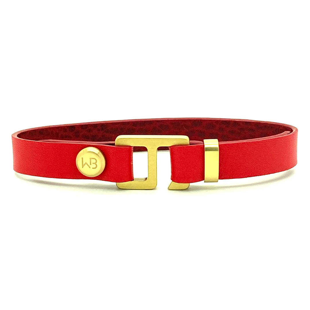 With a trendy, cool modern vibe, this red Italian leather cuff bracelet is paired with your choice of brushed stainless steel, brass or black ceramic hardware. Our signature cuff bracelet is a modern staple for your WristBend collection. Made by WristBend