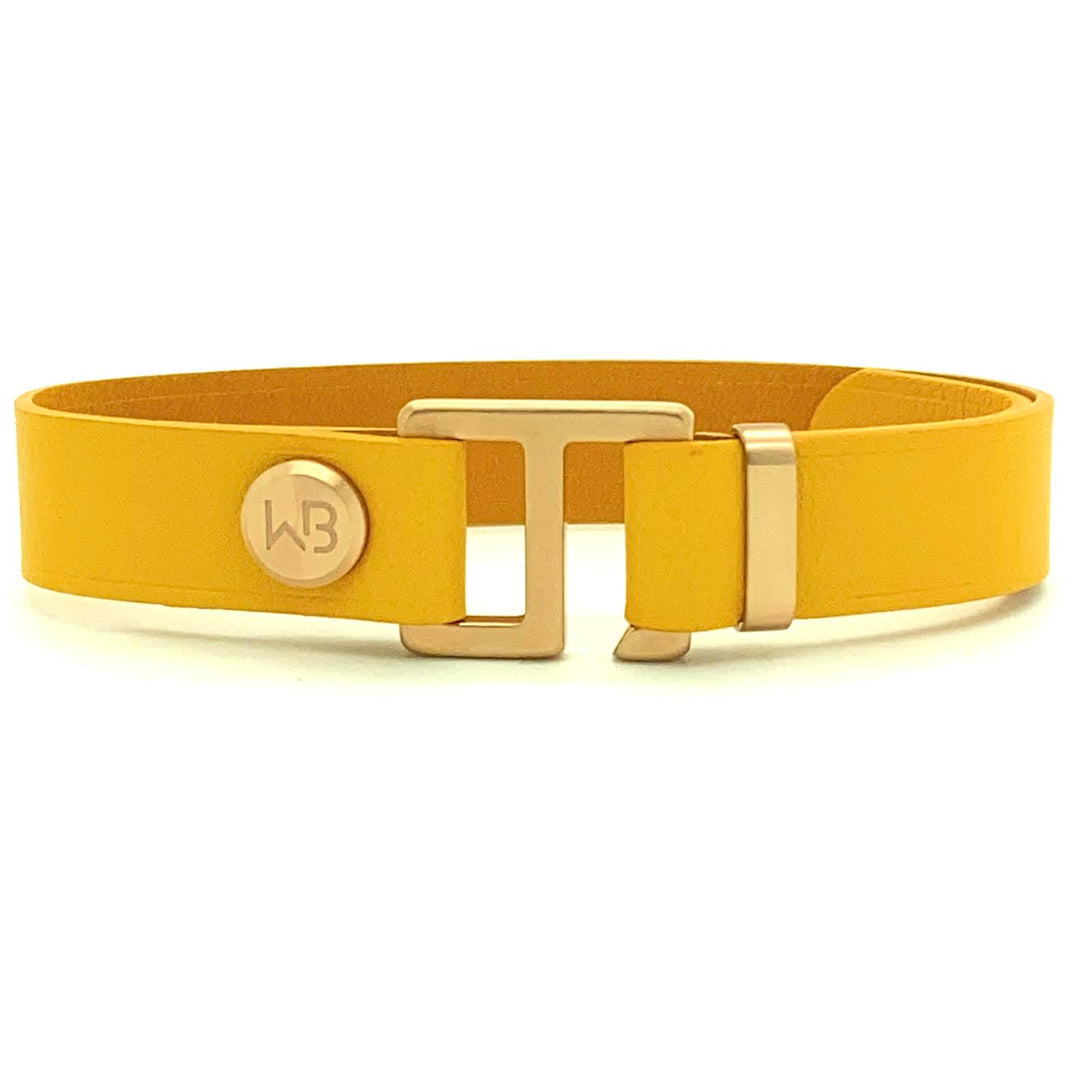 Our striking yellow leather cuff bracelet is paired perfectly with our artisan designed, lightly brushed hardware.  Your hardware choices include Rose Gold, Yellow Gold, Stainless Steel and Black Ceramic. This adjustable size bracelet is a distinctive piece worn alone or with a WristBend stacking bracelet. Made by WristBend