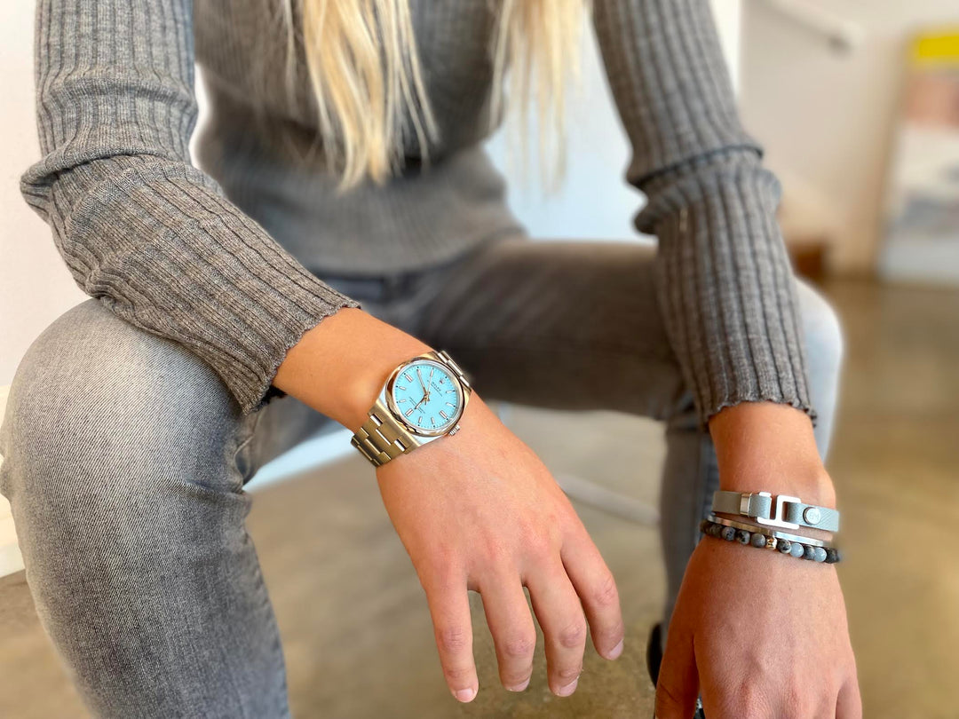 With a trendy, cool modern vibe, this French charcoal/smoke grey leather cuff bracelet is paired with your choice of brushed stainless steel, brass or black ceramic hardware. Our signature cuff bracelet is a modern staple for your WristBend collection. Made by WristBend