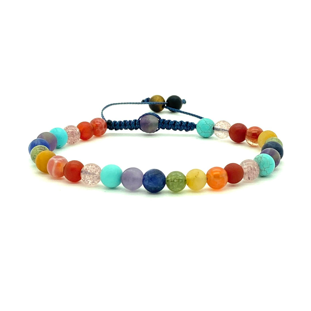 Get your Pride on! This popular, assorted gemstone beaded bracelet gives off a cool, confident vibe. Hand knotted adjustable cord for a perfect fit. We are a lesbian owned company and proudly support our community! Made by WristBend