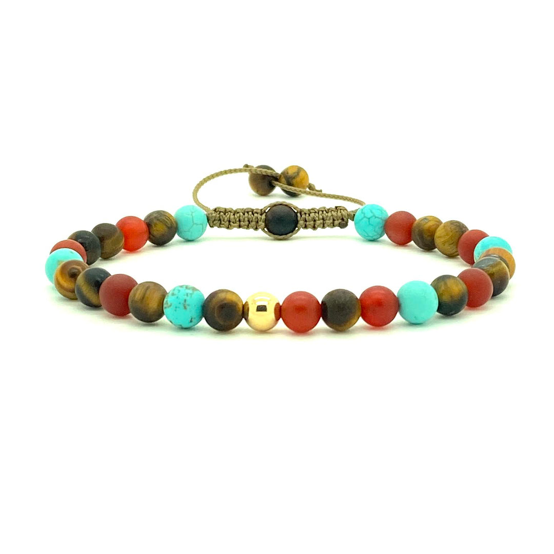 Tiger's Eye is a powerful stone that helps to release fear and anxiety and aids harmony and balance. Paired with Turquoise and Carnelian gemstones, with your choice of 14K white, yellow or rose gold bead. Hand knotted adjustable cord for a perfect fit. Made by WristBend