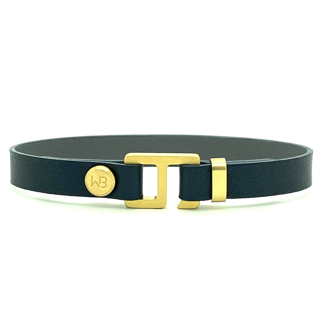 With a trendy, cool modern vibe, this navy blue/ charcoal grey leather cuff bracelet is paired with your choice of brushed stainless steel, brass or black ceramic hardware. Our signature cuff bracelet is a modern staple for your WristBend collection. Made by WristBend