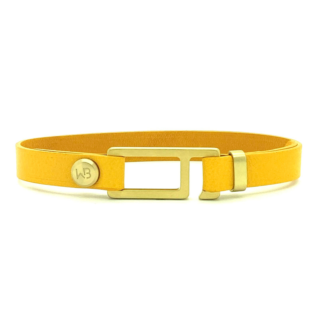 Our striking Buttero yellow Italian leather bracelet is paired perfectly with our artisan designed, lightly brushed hardware. Your hardware choices include Rose Gold, Yellow Gold, Stainless Steel or Black Ceramic. This adjustable size bracelet is a distinctive piece worn alone or with a WristBend stacking bracelet. Made by WristBend