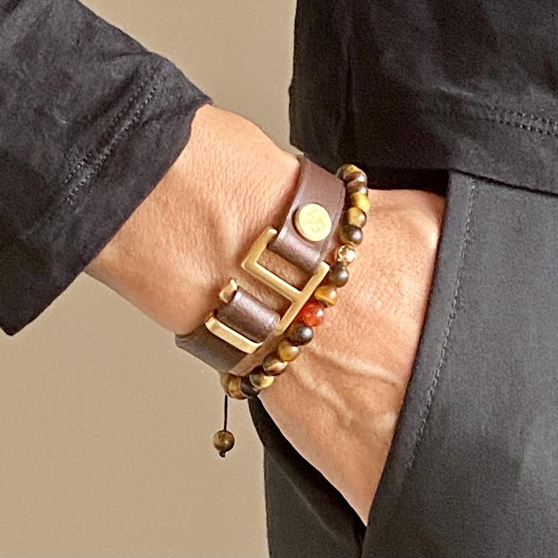 Our striking dark brown Italian leather cuff bracelet is paired perfectly with our artisan designed  hardware. Choice includes brushed rose gold, yellow gold, stainless steel or black ceramic. This adjustable size bracelet is a distinctive piece worn alone or with a WristBend stacking bracelet. Made by WristBend