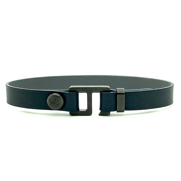 With a trendy, cool modern vibe, this navy blue/ charcoal grey leather cuff bracelet is paired with your choice of brushed stainless steel, brass or black ceramic hardware. Our signature cuff bracelet is a modern staple for your WristBend collection. Made by WristBend
