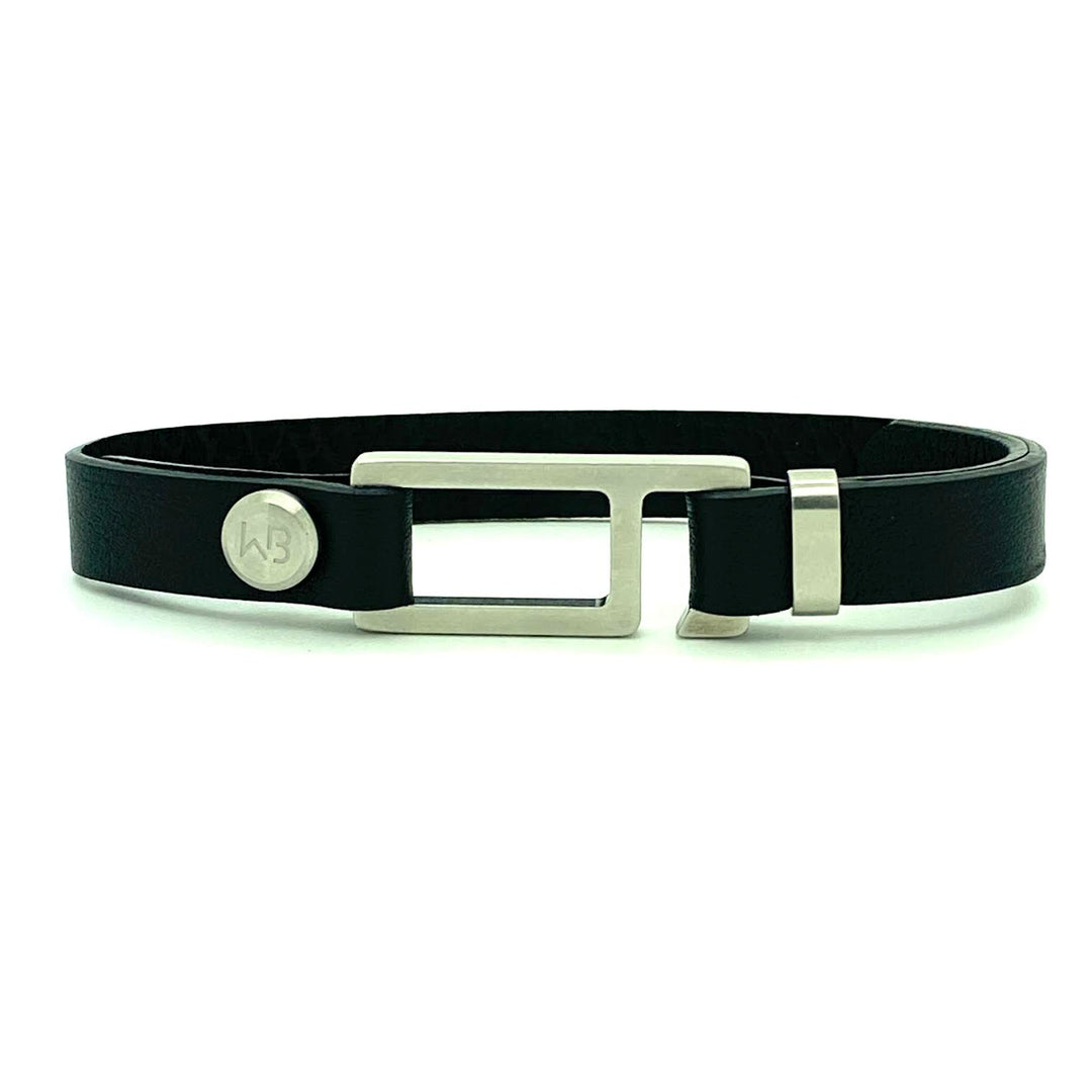 Our striking black Italian leather bracelet is paired perfectly with our artisan designed, lightly brushed hardware. Your hardware choices include Rose Gold, Yellow Gold, Stainless Steel or Black Ceramic. This adjustable size bracelet is a distinctive piece worn alone or with a WristBend stacking bracelet. Made by WristBend