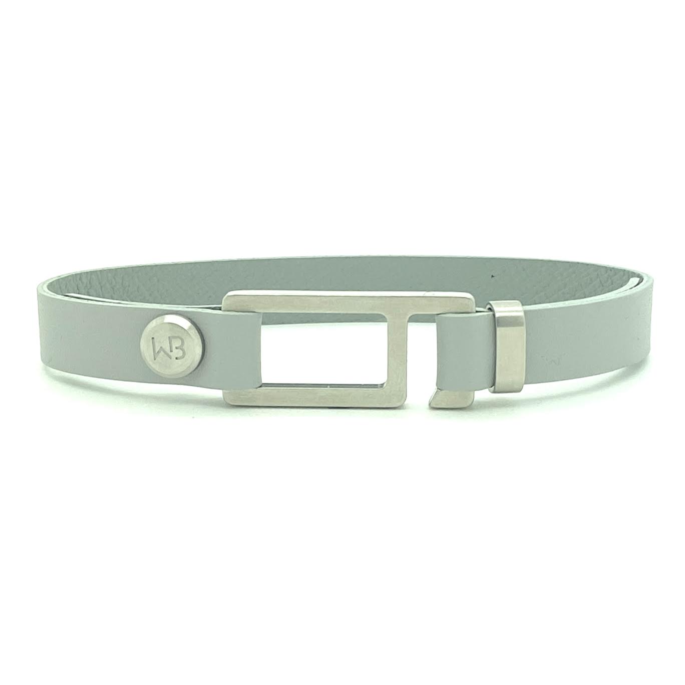 Our striking smoke grey French leather bracelet is paired perfectly with our artisan designed, lightly brushed hardware. Your hardware choices include Rose Gold, Yellow Gold, Stainless Steel or Black Ceramic. This adjustable size bracelet is a distinctive piece worn alone or with a WristBend stacking bracelet. Made by WristBend