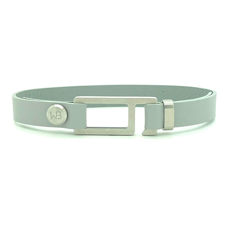 Our striking smoke grey French leather bracelet is paired perfectly with our artisan designed, lightly brushed hardware. Your hardware choices include Rose Gold, Yellow Gold, Stainless Steel or Black Ceramic. This adjustable size bracelet is a distinctive piece worn alone or with a WristBend stacking bracelet. Made by WristBend