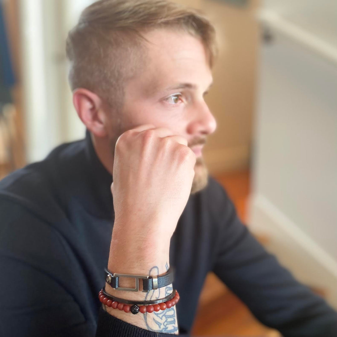 Our striking black Italian leather bracelet is paired perfectly with our artisan designed, lightly brushed hardware. Your hardware choices include Rose Gold, Yellow Gold, Stainless Steel or Black Ceramic. This adjustable size bracelet is a distinctive piece worn alone or with a WristBend stacking bracelet. Made by WristBend