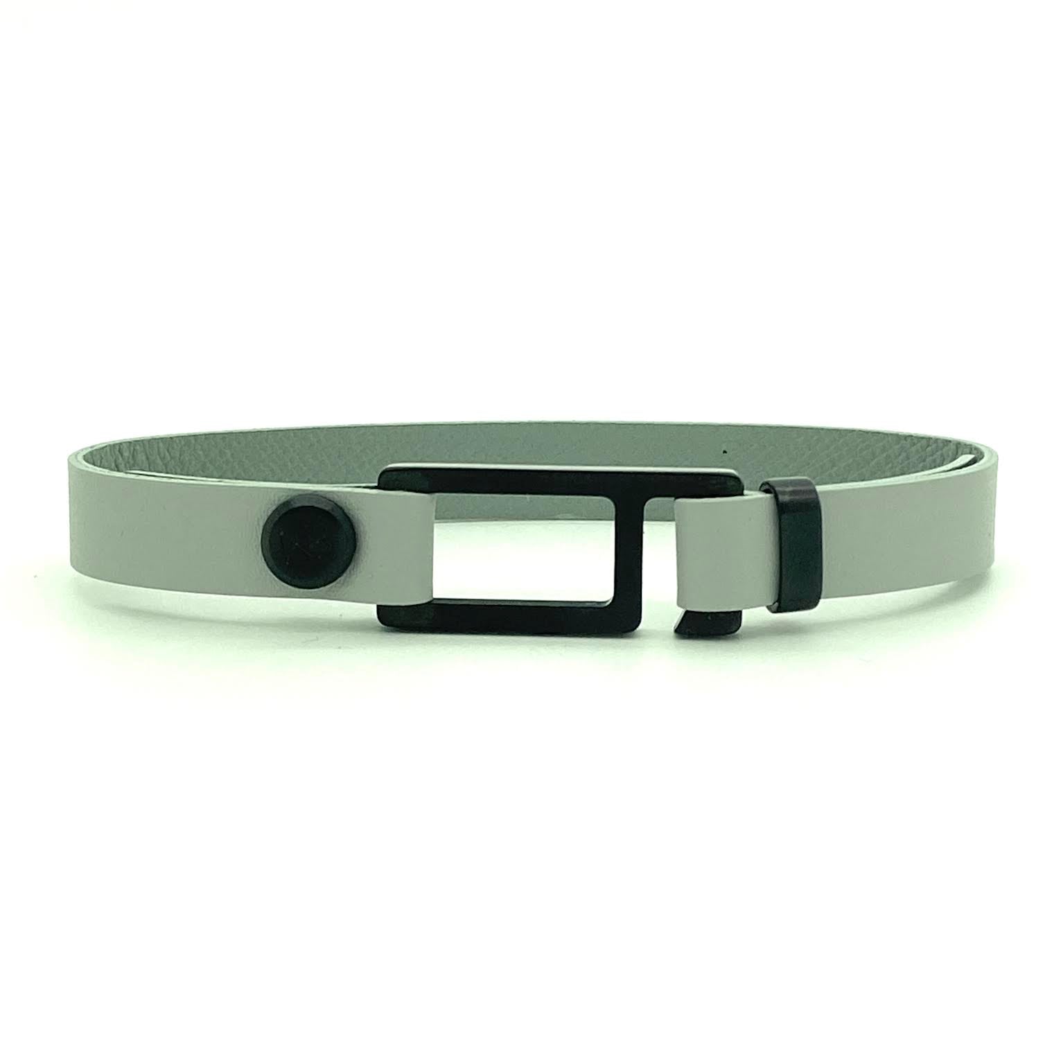 Our striking charcoal grey French leather bracelet is paired perfectly with our artisan designed, lightly brushed hardware. Your hardware choices include Rose Gold, Yellow Gold, Stainless Steel or Black Ceramic. This adjustable size bracelet is a distinctive piece worn alone or with a WristBend stacking bracelet. Made by WristBend