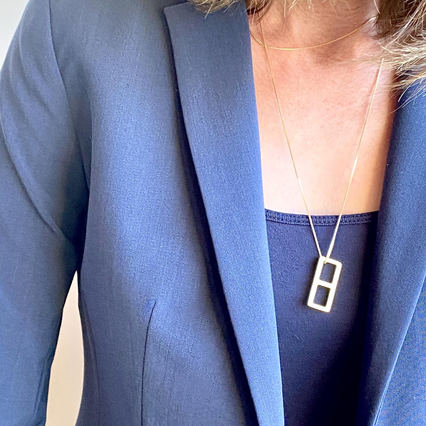This meticulously designed with a geometrical flavor, this brushed rose gold pendant necklace is perfect worn alone or paired with a WristBend stacking bracelet. Made by WristBend
