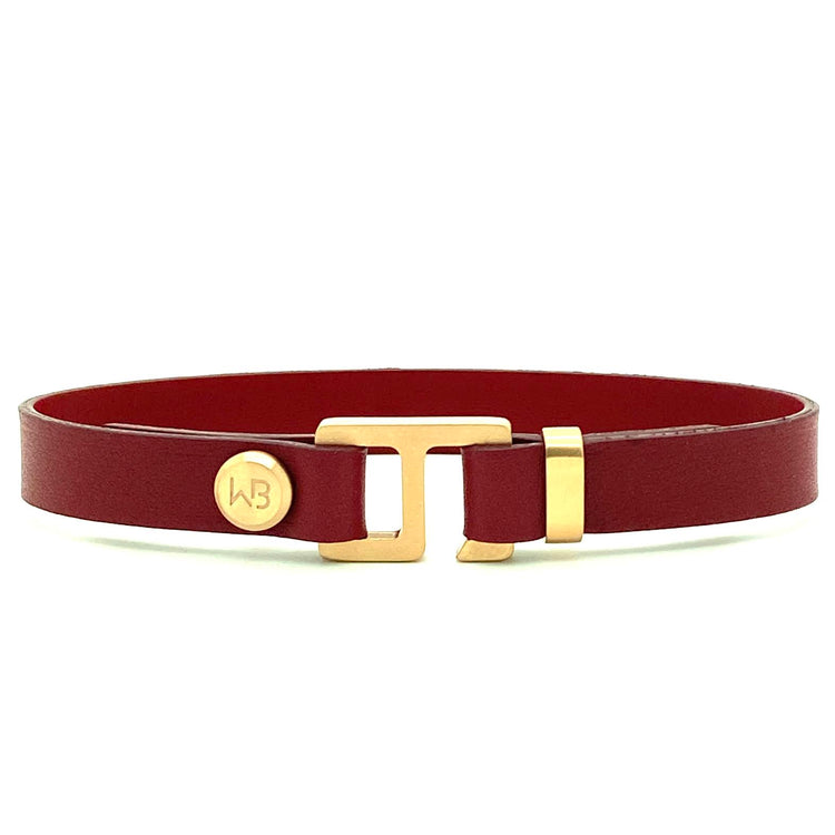 With a trendy, cool modern vibe, this burgundy/black Italian leather cuff bracelet is paired with your choice of brushed stainless steel, brass or black ceramic hardware. Our signature cuff bracelet is a modern staple for your WristBend collection. Made by WristBend