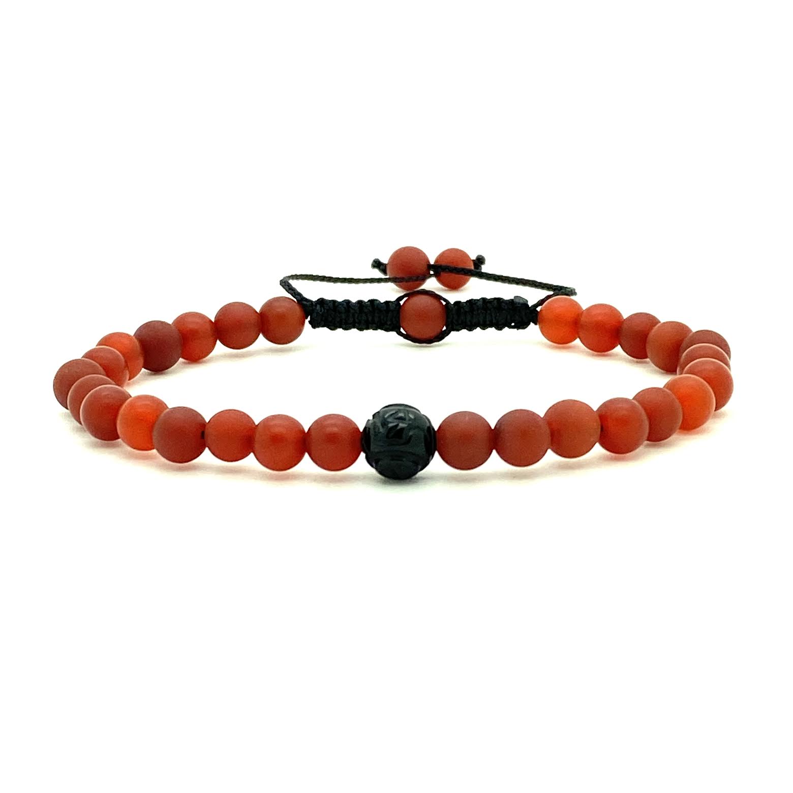 Carnelian symbolizes bold energy, warmth, and a joy that lingers. This popular matte beaded bracelet is accented with a single carved black onyx dragon bead for a cool, confident look. Hand knotted adjustable cord for a perfect fit. Made by WristBend