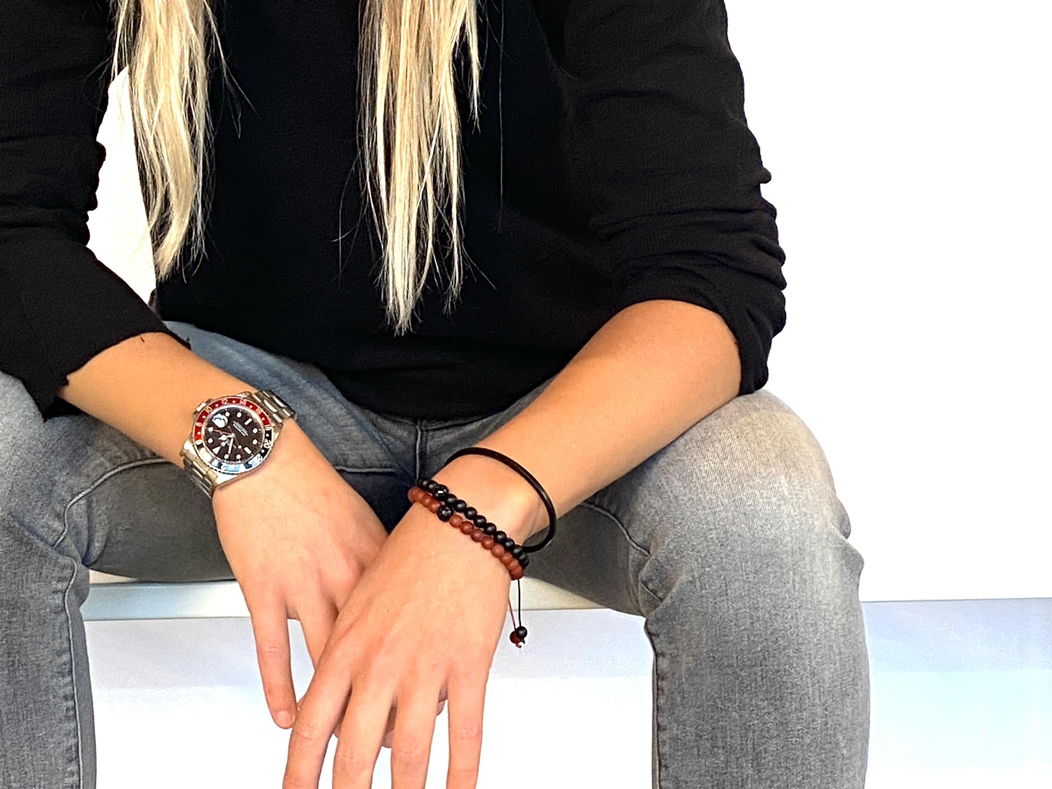 Carnelian symbolizes bold energy, warmth, and a joy that lingers. This popular beaded bracelet is accented with a single carved black onyx dragon bead for a cool, confident look. Hand knotted adjustable cord for a perfect fit. Made by WristBend