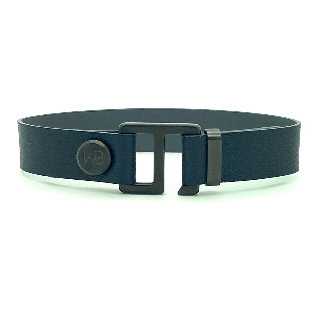Our striking navy blue/charcoal grey leather cuff bracelet is paired perfectly with your choice of our artisan designed brushed hardware. Choices include rose gold, yellow gold, stainless steel or black ceramic. This adjustable size bracelet is a distinctive piece worn alone or with a WristBend stacking bracelet.  Made by WristBend