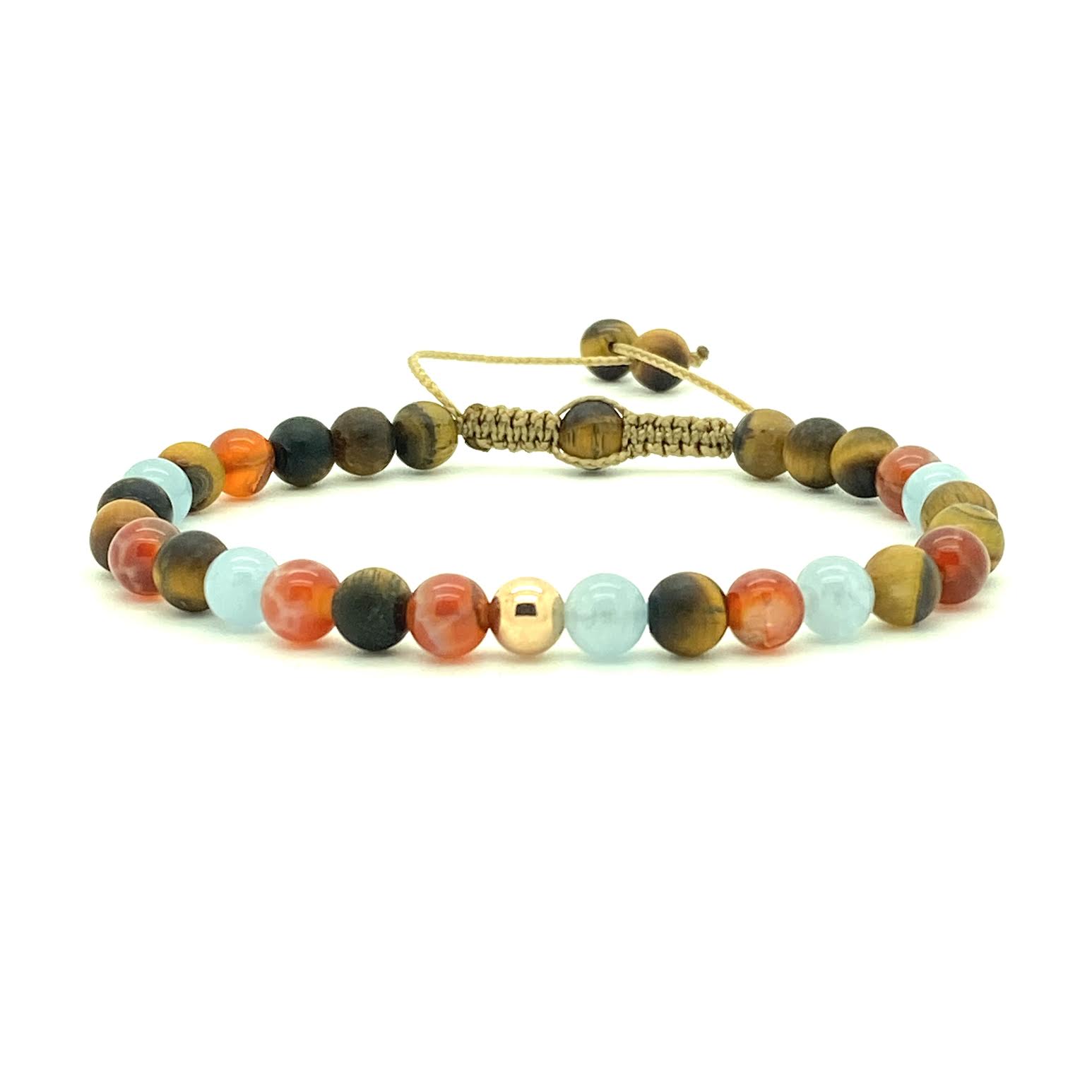 Tiger's Eye is a powerful stone that helps to release fear and anxiety and aids harmony and balance. Paired with Fire Agate and Aquamarine gemstones, with your choice of 14K white, yellow or rose gold bead. Hand knotted adjustable cord for a perfect fit. Made by WristBend