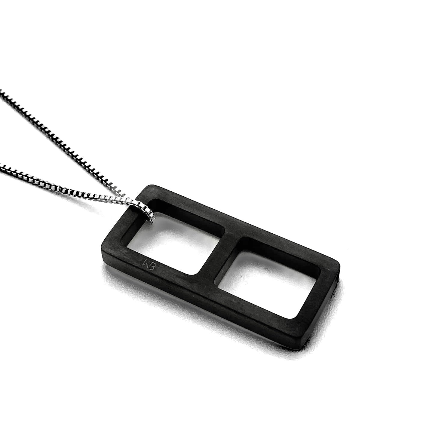 This meticulously designed with a geometrical flavor, this brushed black ceramic pendant necklace is perfect worn alone or paired with a WristBend stacking bracelet. Made by WristBend