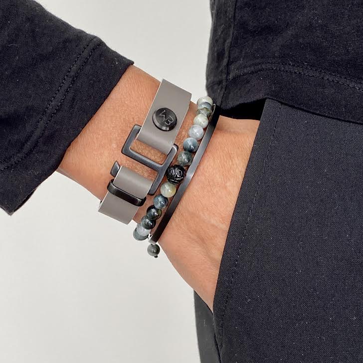 Labradorite beads act to stimulate intuition and to enhance protective energy. These matte Labradorite beads are accented with a single black dragon onyx bead. Hand knotted adjustable cord for a perfect fit. Made by WristBend