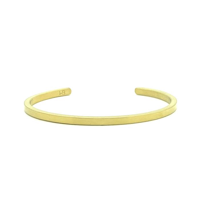 This meticulously designed 14K brushed yellow gold cuff bracelet is perfect worn alone or paired with a WristBend stacking bracelet. Can slightly manipulate size for a perfect fit. Made by WristBend