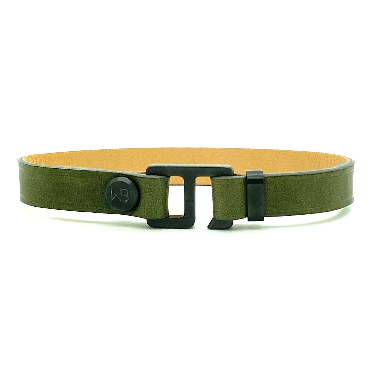 With a trendy, cool modern vibe, this sapin/patina gray Italian leather cuff bracelet is paired with your choice of brushed stainless steel, brass or black ceramic hardware. Our signature cuff bracelet is a modern staple for your WristBend collection.  Made by WristBend