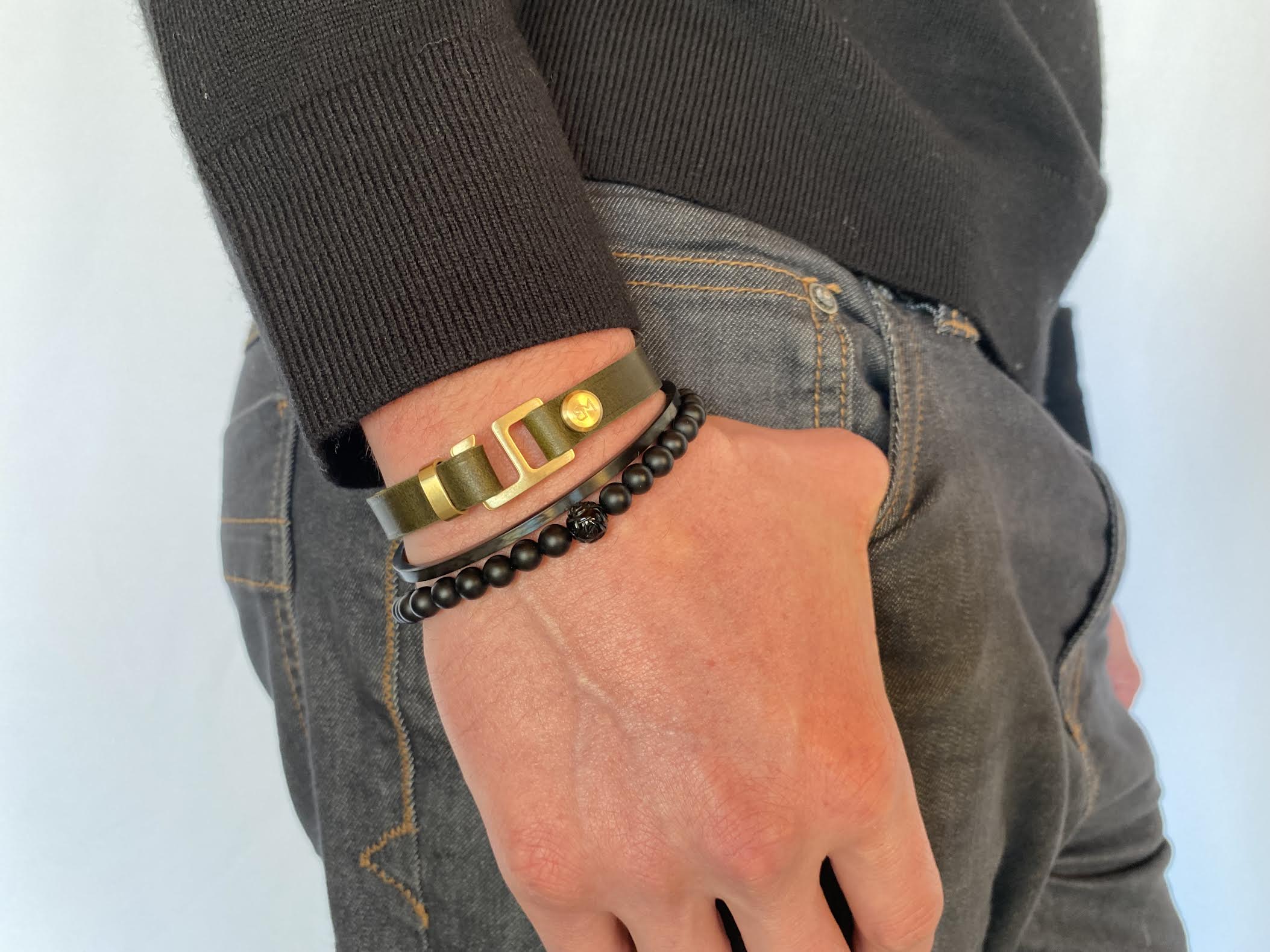 With a trendy, cool modern vibe, this olive/tuscan Italian leather cuff bracelet is paired with your choice of brushed yellow gold, rose gold, stainless steel, or black ceramic hardware. Our signature cuff bracelet is a modern staple for your WristBend collection.  Made by WristBend