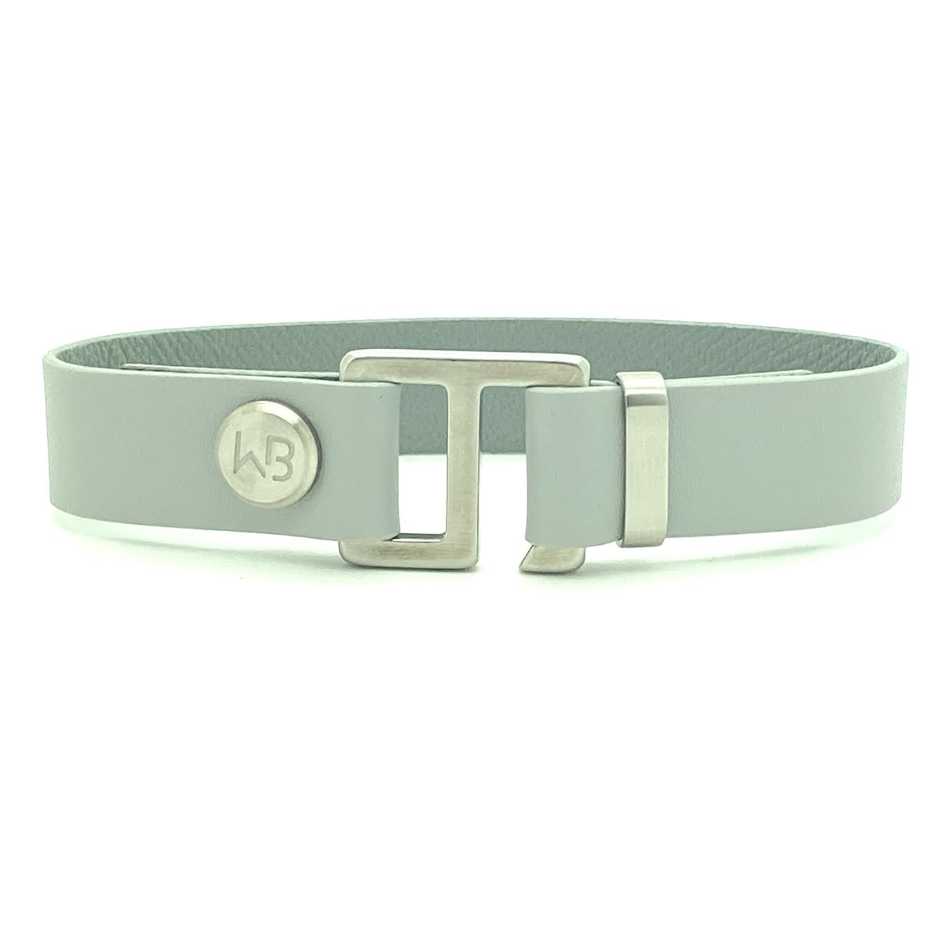 Our striking smoke grey leather cuff bracelet is paired perfectly with our artisan designed hardware. Choice includes rose gold, yellow gold, stainless steel or black ceramic. This adjustable size bracelet is a distinctive piece worn alone or with a WristBend stacking bracelet. Made by WristBend