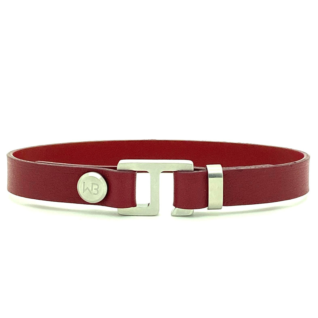 With a trendy, cool modern vibe, this burgundy/black Italian leather cuff bracelet is paired with your choice of brushed stainless steel, brass or black ceramic hardware. Our signature cuff bracelet is a modern staple for your WristBend collection. Made by WristBend