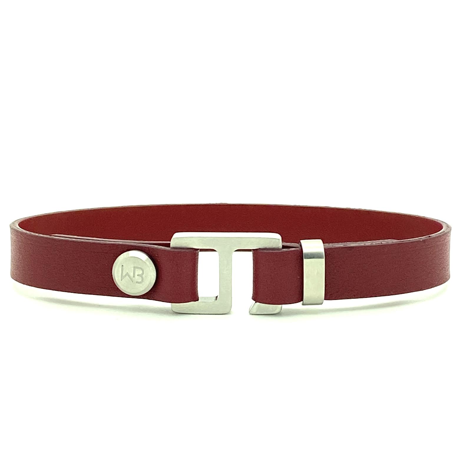 With a trendy, cool modern vibe, this burgundy/black Italian leather cuff bracelet is paired with your choice of brushed stainless steel, brass or black ceramic hardware. Our signature cuff bracelet is a modern staple for your WristBend collection. Made by WristBend