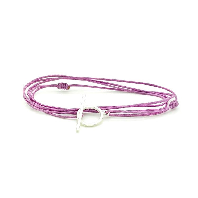Popular hand knotted adjustable cord bracelet with sterling silver clasp. WristBend