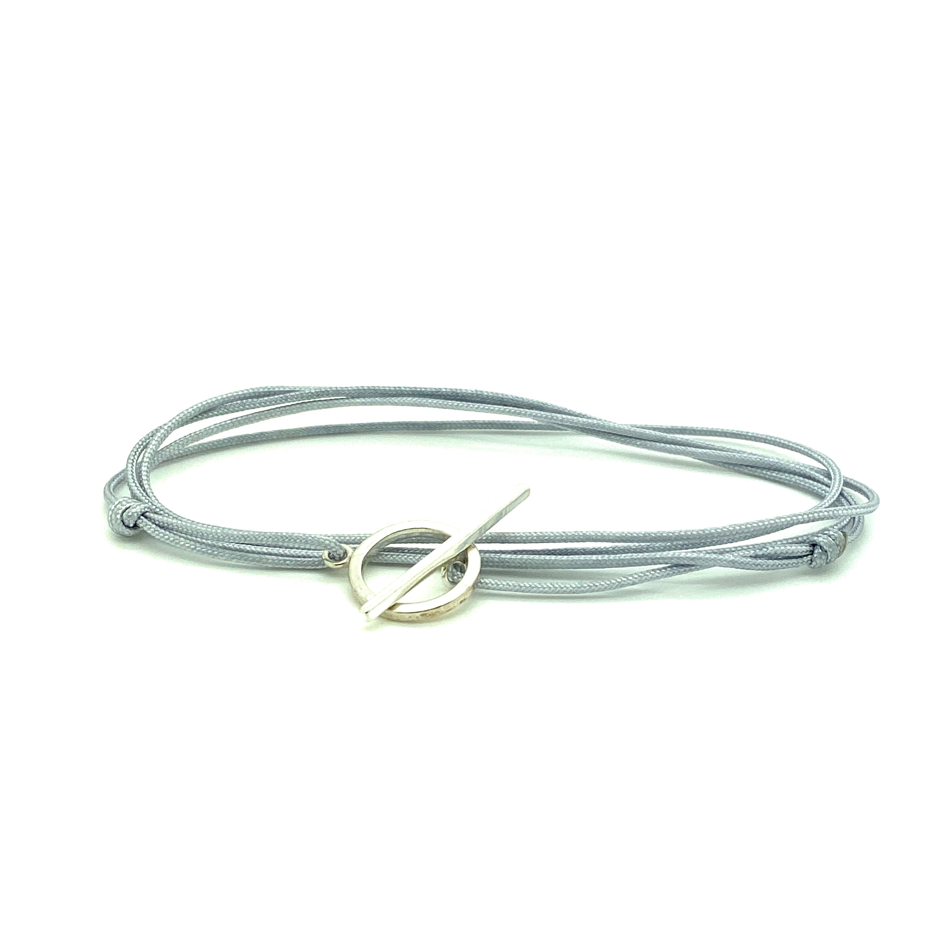 Knotted cord for adjustable, easy fit. Sterling silver clasp. Rope braelet. WristBend