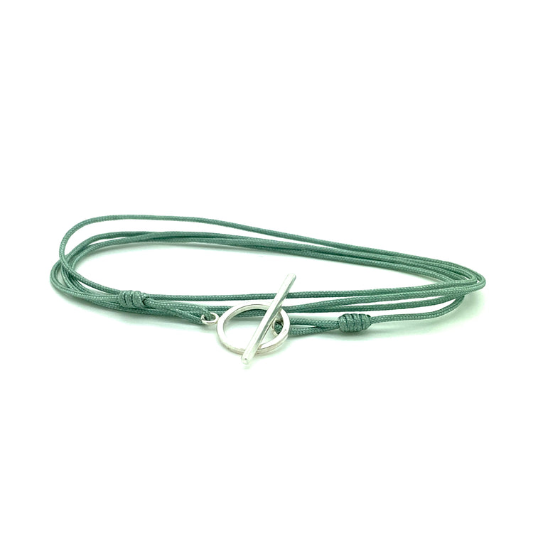 Cool handknotted adjustable cord bracelet with a sterling silver clasp. WristBend